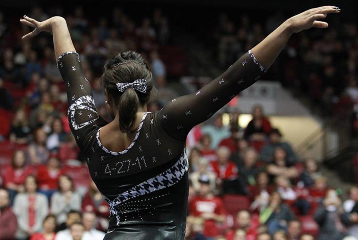 An Alabama gymnast wears a leotard sporting "4-27-11" in memory of the devastating tornadoes that swept through Tuscaloosa